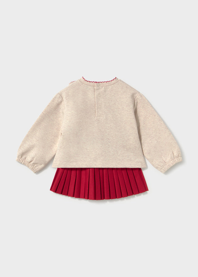Conjunto sudadera corazones y falda plisada bebé